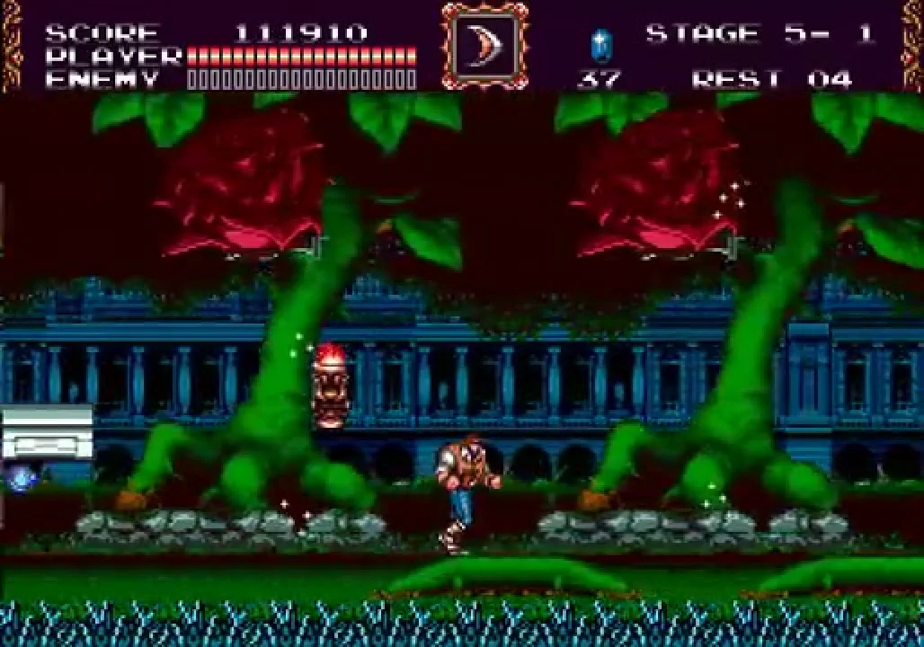 John Morris mid-jump above a coffin-shaped platform. A giant red rose blooms against tree-bark scenery to the left; a Versailles palace facade is faintly visible beyond. Stage indicator reads '5 — 1.'