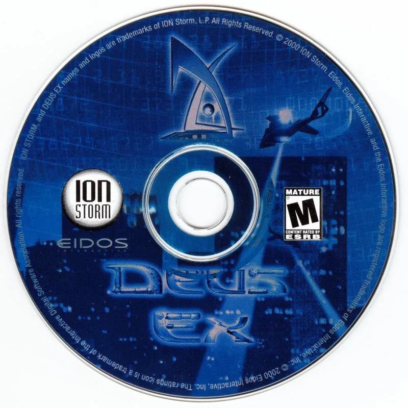 North American Windows CD-ROM for Deus Ex, 2000: blue-toned disc face with the angular Deus Ex 'X' logo, JC Denton silhouetted against a city skyline, Ion Storm pin-badge logo and Eidos wordmark below.