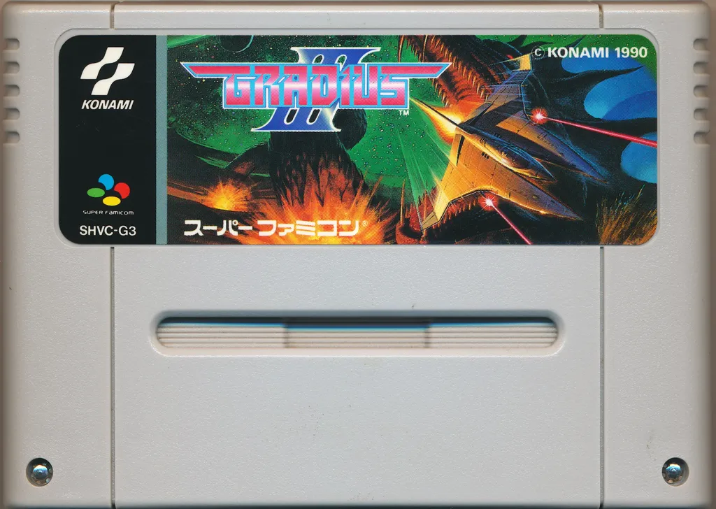 Super Famicom Gradius III cartridge (SHVC-G3) with the green starfield label.