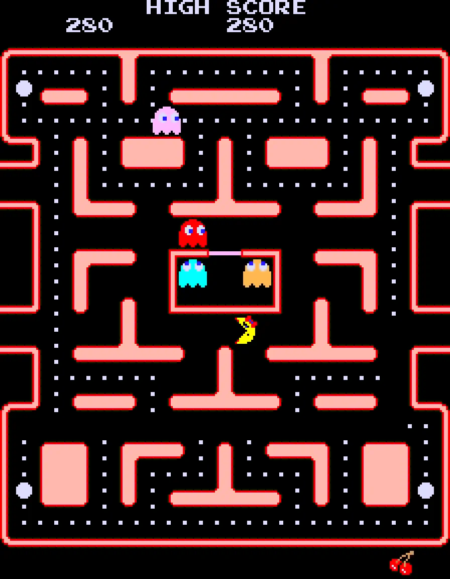 The pink second maze, with two ghosts patrolling the central box and the character approaching from below.