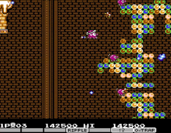 The Parodius Da! pachinko stage — golden Japanese architecture with brick walls and a yellow 0000-score pachinko machine bottom-left, pink Moai-pachinko-balls flying across the playfield as Vic Viper threads through.