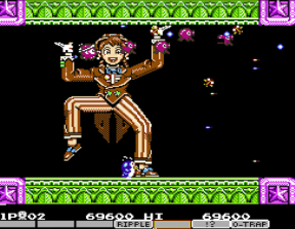 A Vegas-dancer boss character in feathered cabaret costume on the left of the screen, framed by pink and green vaudeville-theatre borders, throwing arrows of bullets across the playfield at Vic Viper on the right.