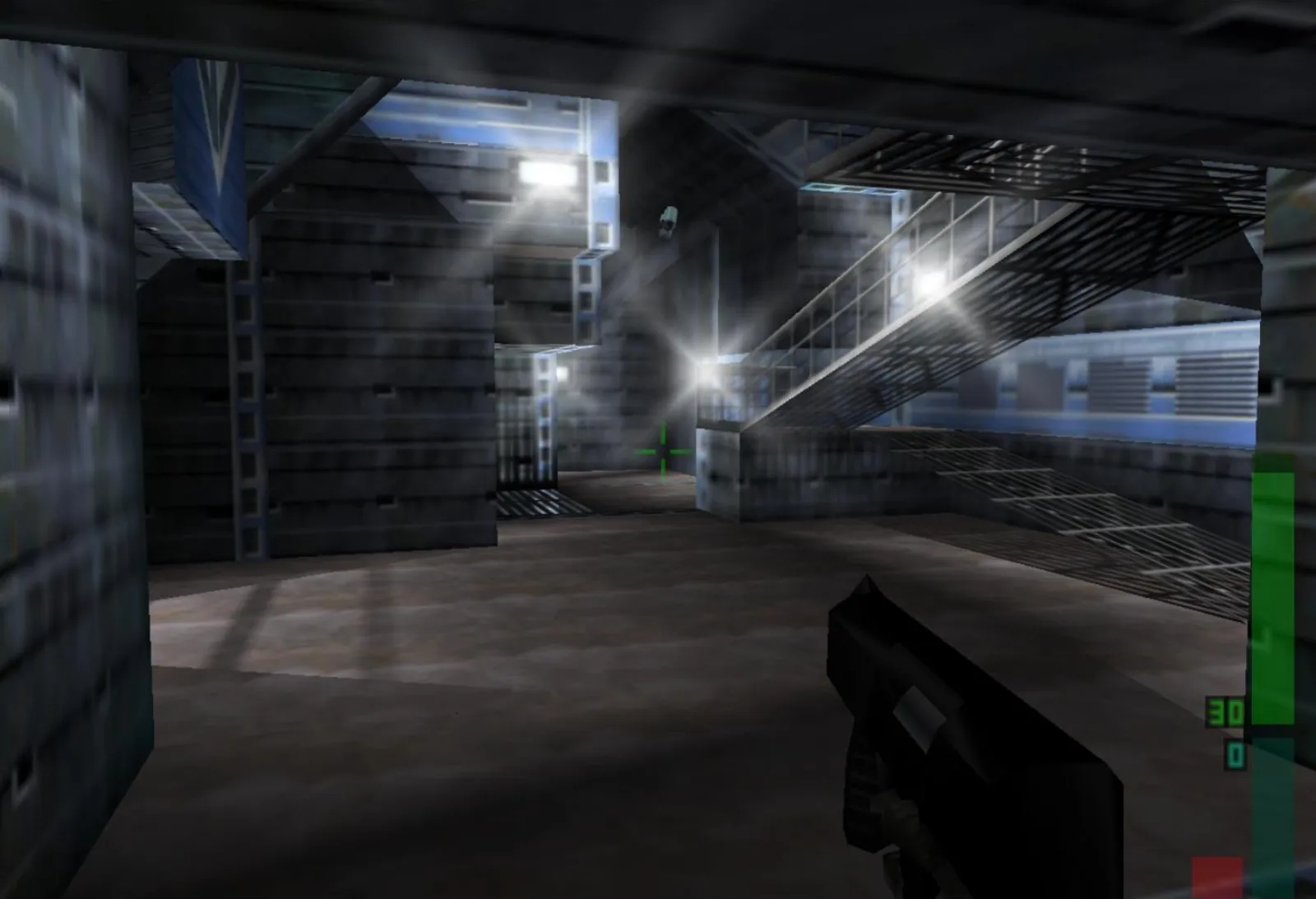 The dataDyne lobby with a staircase and grey industrial walls seen from Joanna Dark's first-person view.