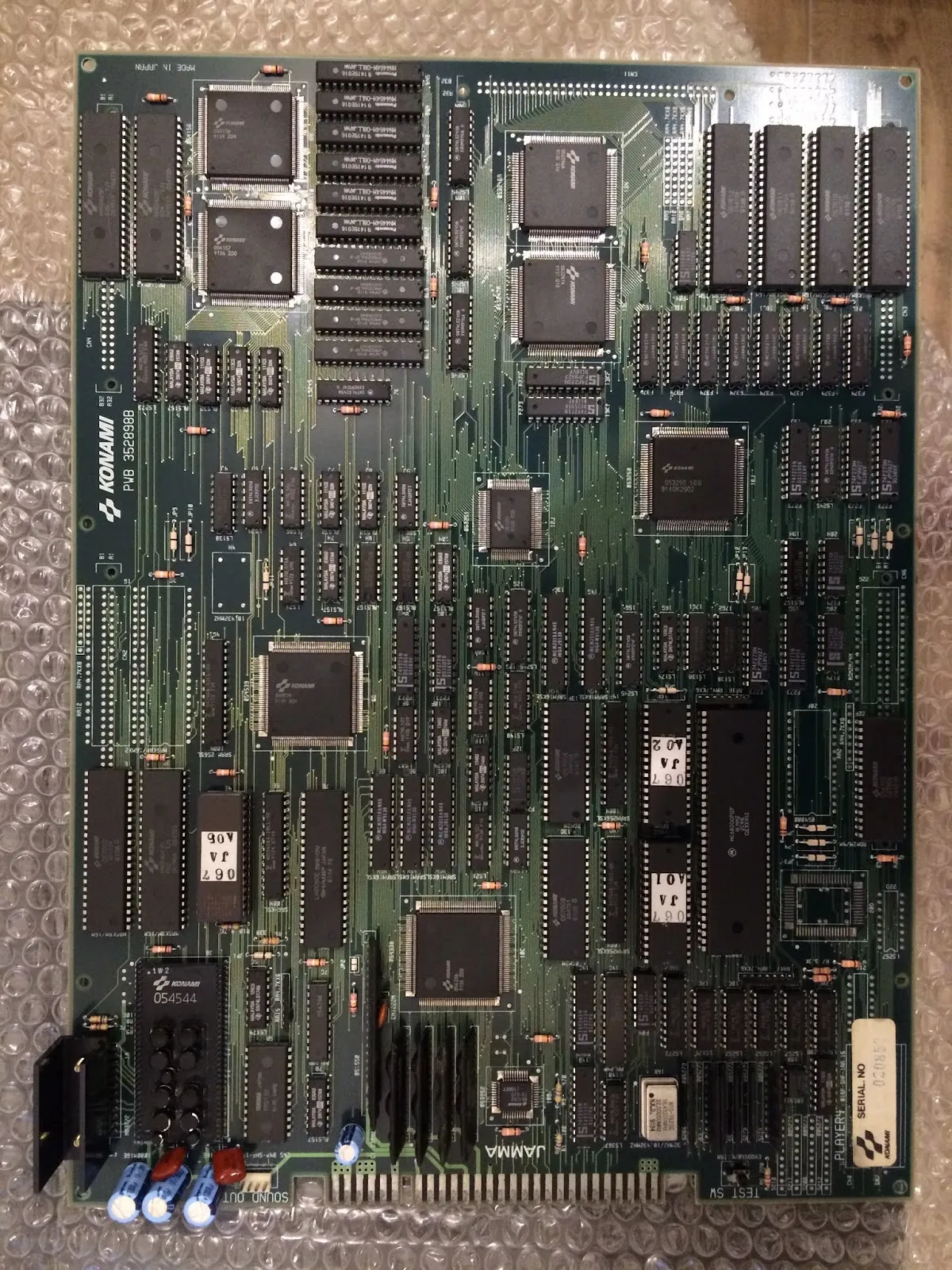 The Konami GX067 Xexex arcade board — a green Konami PCB with custom sprite chips, a 68000 CPU, and a Z80 sound chip.